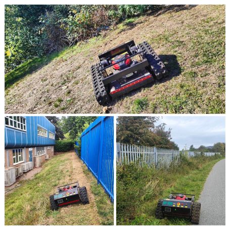 A robotic lawn mower navigating grassy areas near buildings and fences.
